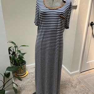 Chico’s navy and white with tan faux suede trim & belt.